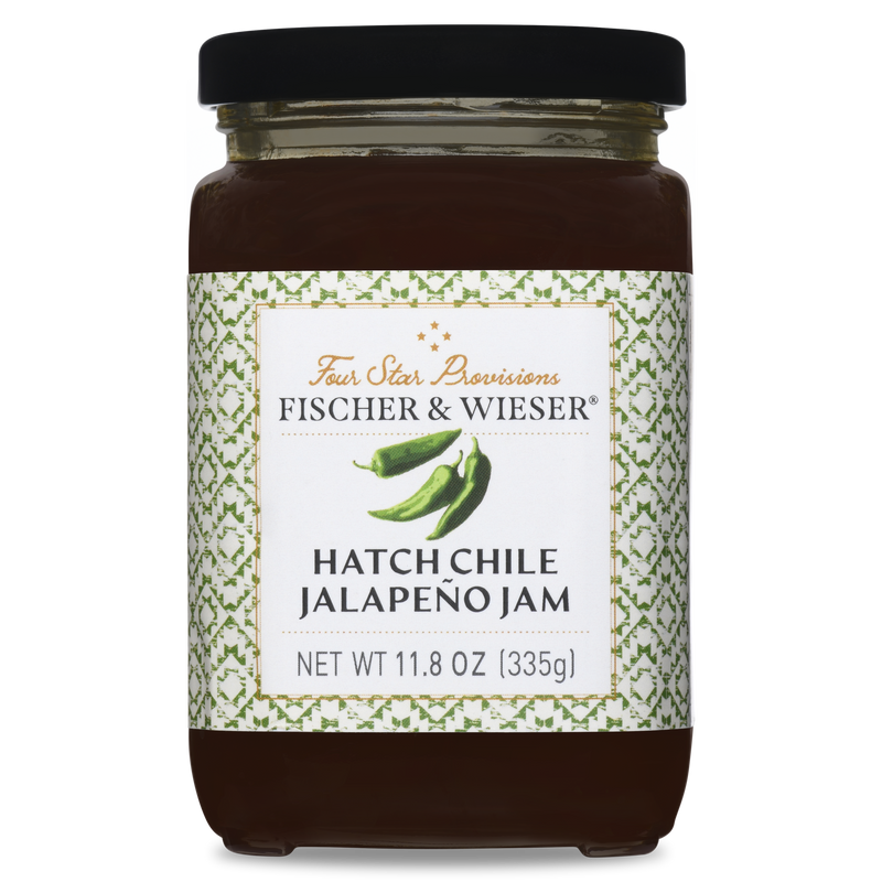 Jar of Hatch Chile Jalapeño Jam with a decorative label on a white background