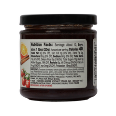 Jar of Fischer & Wieser Cinnamon Orange Tomato Preserves on a white background