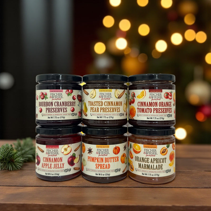 Collection of Fischer & Fischer preserves and spreads with a festive background
