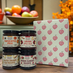 4 preserves on a table