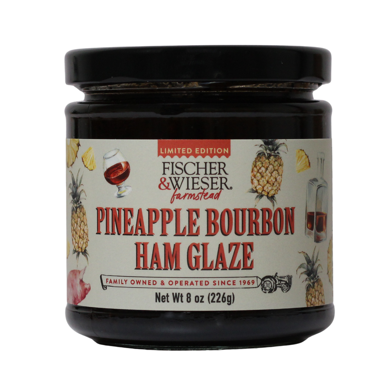 Jar of Pineapple Bourbon Ham Glaze with label on a white background