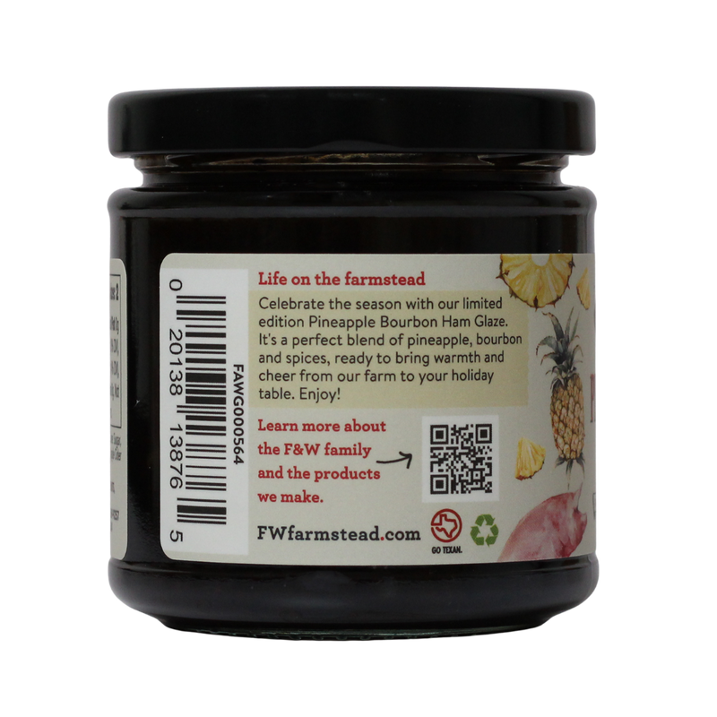 Jar of Pineapple Bourbon Ham Glaze with label on a white background