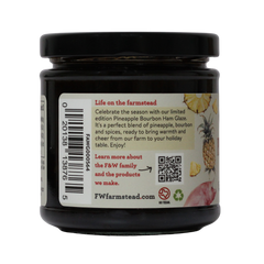 Jar of Pineapple Bourbon Ham Glaze with label on a white background